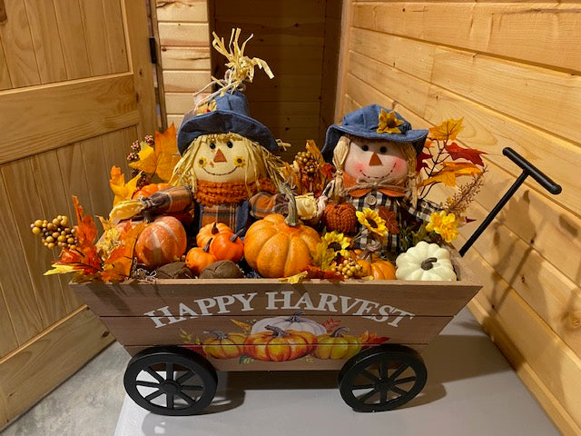 Scarecrows in Brown Pumpkin Wagon